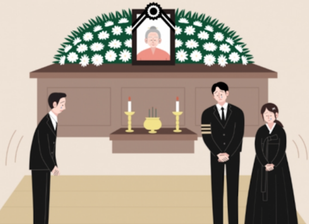 빈소에 놓인 국화꽃과 영정사진